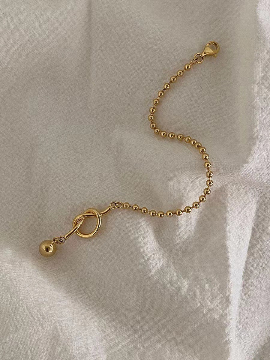 18k gold knot bracelet