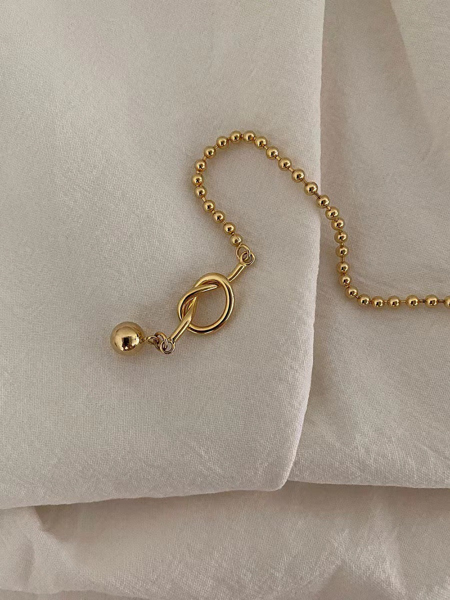 18k gold knot bracelet